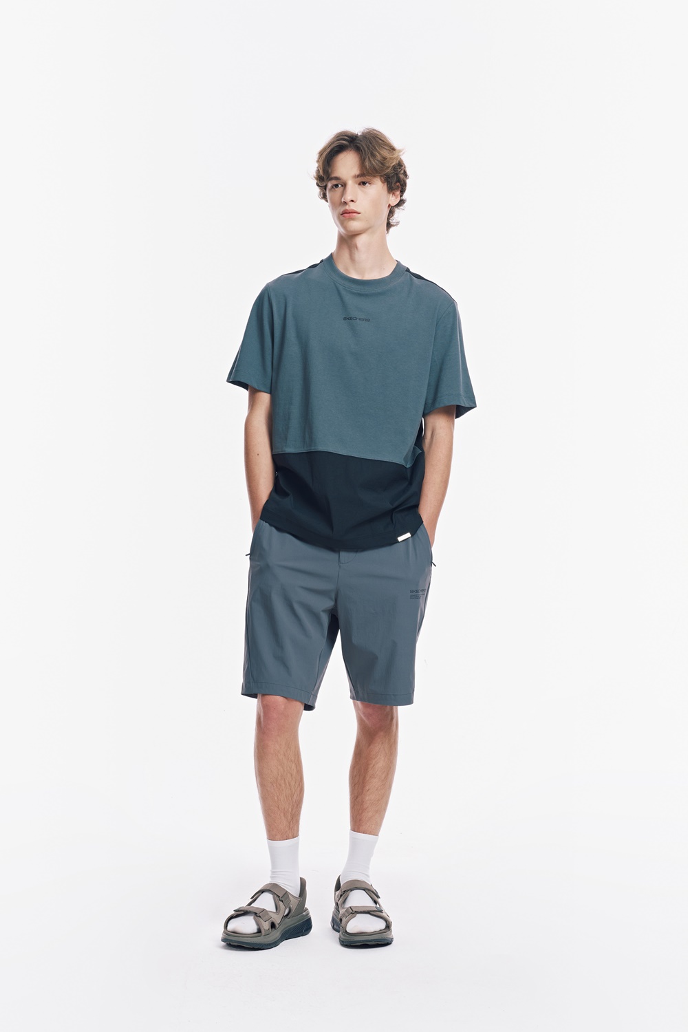 [스케쳐스 어패럴] 남성 우븐+니트 믹스 하이브리드 반팔 티셔츠